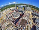 The Tokamak Complex, the Assembly Hall, the Cryoplant and Magnet Power Conversion buildings on the right. ITER Construction site, Cadarache, July 2018 © ITER IO