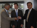 AIF Director Jérôme Paméla (left) hands over the JWS3 keys to ITER DG Kaname Ikeda (right). In the background is Laurent Schmieder, Head of the Site, Buildings and Power Supplies Division at F4E.